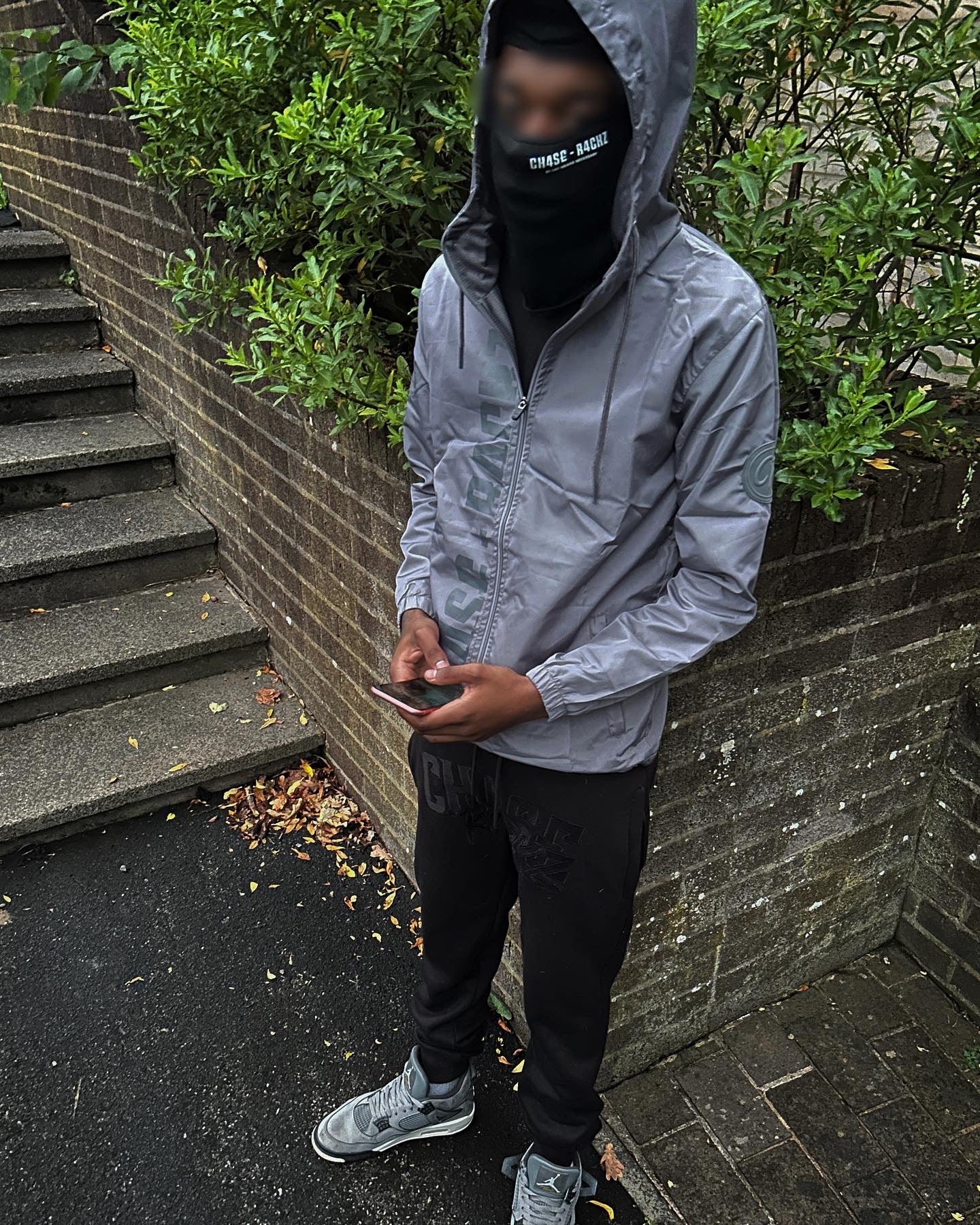 GREY WINDBREAKER